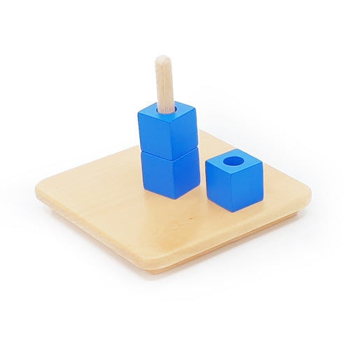 Cubes on a Vertical Dowel